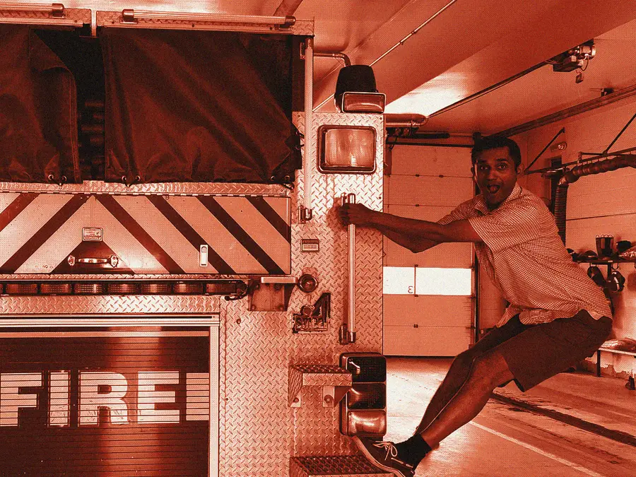 Ajay on a fire truck, printed as a two-colour risograph.